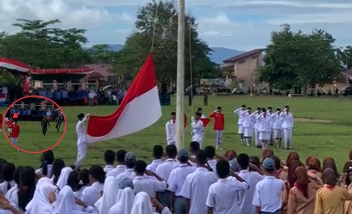 ODGJ tiba-tiba berbaris dan menuju barisan Pasukan Pengibar Bendera Merah Putih pada Upacara HUT RI di Kecamatan Malifut Halmahera Utara.(beritadetik.id).