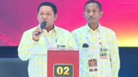 Calon Gubernur dan Wakil Gubernur Maluku Utara, Aliong Mus-Sahril Tahir saat memaparkan visi misi pada debat kedua di UMMU Ternate, Selasa (19/11/2024).