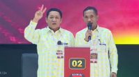 Calon Gubernur dan Wakil Gubernur Maluku Utara, Aliong Mus-Sahril Tahir saat memaparkan visi misi pada debat kedua di UMMU Ternate, Selasa (19/11/2024).
